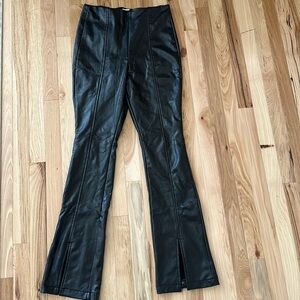 Black leather pants with slits